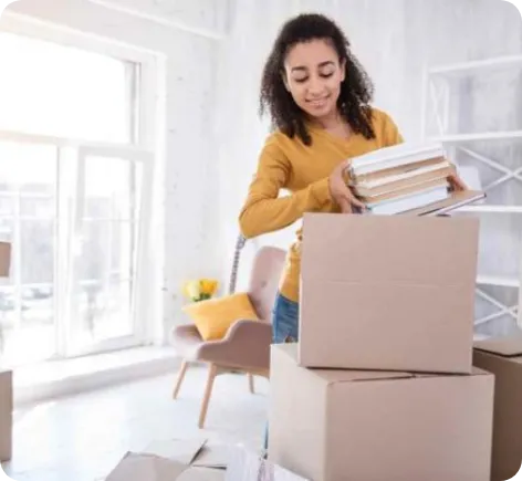 girl packing boxes